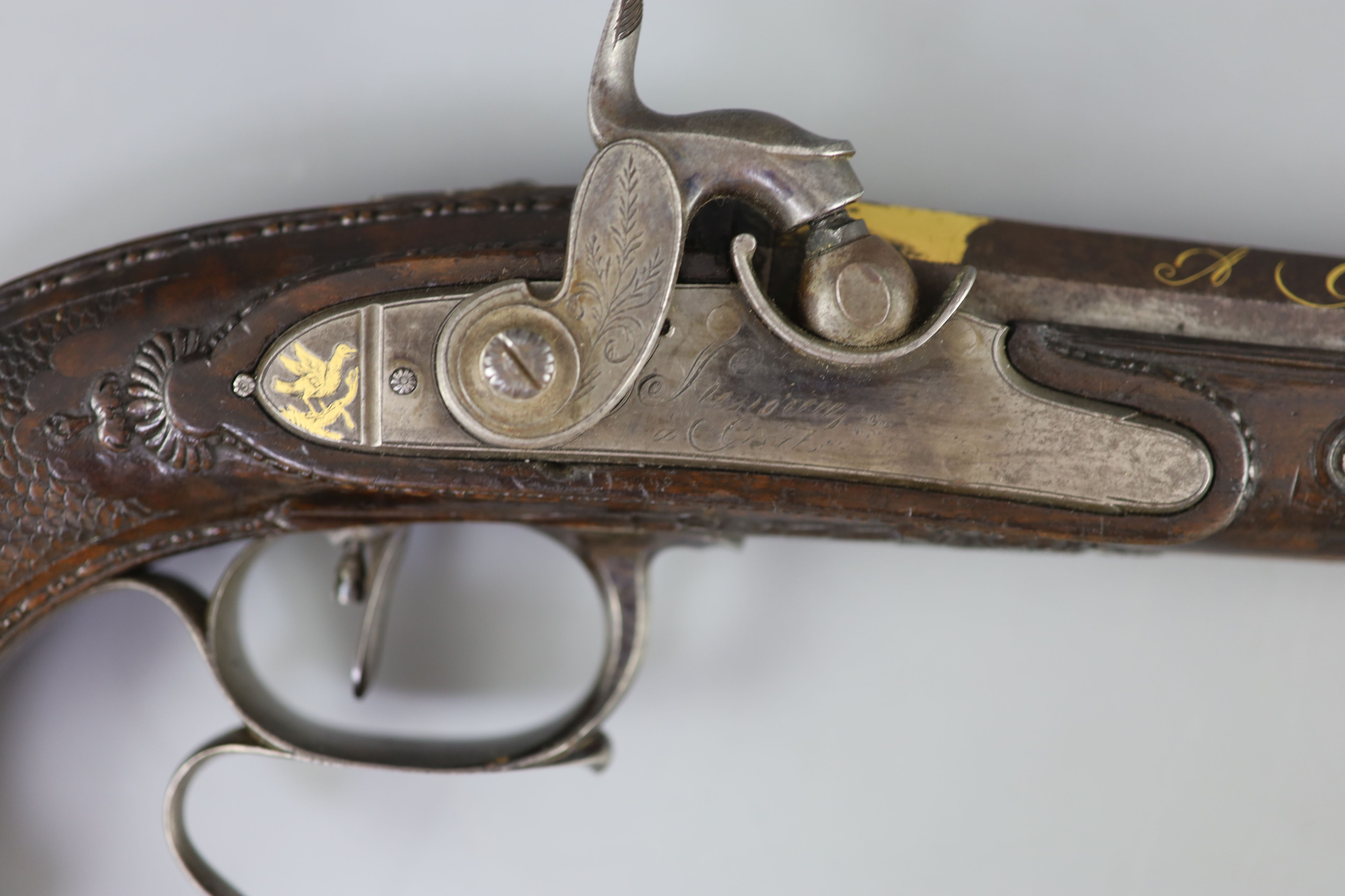 A late 18th/ early 19th century French gold inlaid pistol by Henraux 14.5in.